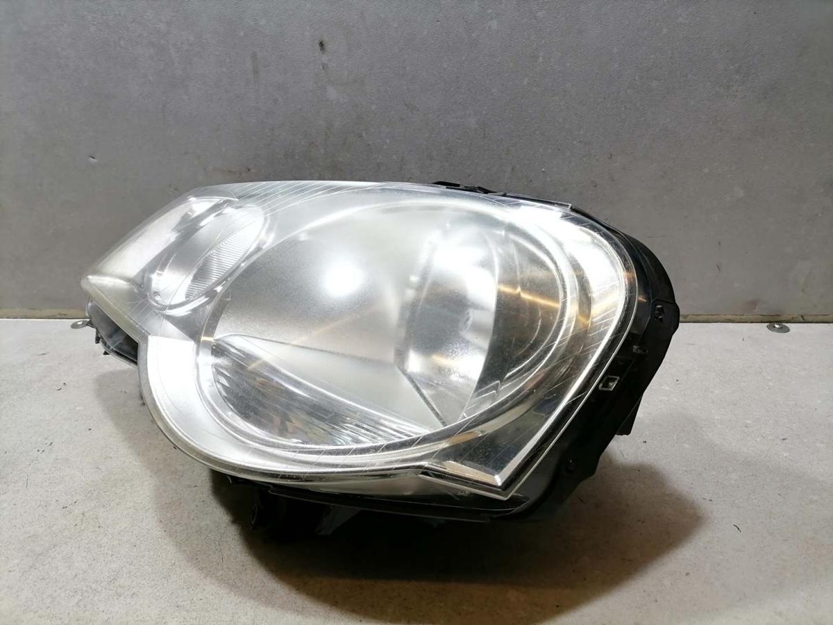 VW Polo 9N3 original Scheinwerfer vorn links Halogen oberhalb leicht vegilbt Bj.2005 VW Polo 9N3 original Scheinwerfer vorn links Halogen oberhalb leicht vegilbt Bj.2005